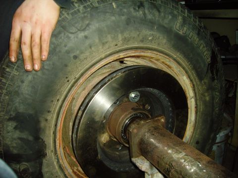 1991 Ford Bronco - Close-up view of a vehicle's wheel hub and brake rotor assembly.