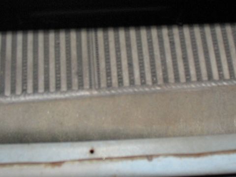 2001 Pontiac Trans Am - Close-up view of a vehicle's radiator grille, showing its striped pattern.