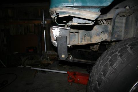 1991 Ford Bronco - A custom bracket is attached to the vehicle's frame, suggesting modifications are underway.
