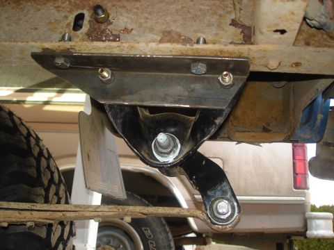 1990 Ford Bronco - Close-up of the rear leaf spring mounting bracket on a 1990 Ford Bronco.