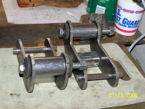 1988 Suzuki Samurai - Custom leaf spring shackles are shown, likely for an off-road vehicle modification.