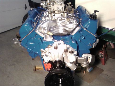 1978 Ford Bronco - Engine assembly with blue painted block and chrome components.