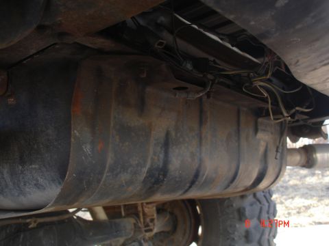 1979 Ford Bronco - Underside view of a 1979 Ford Bronco, showing the fuel tank and exhaust system.
