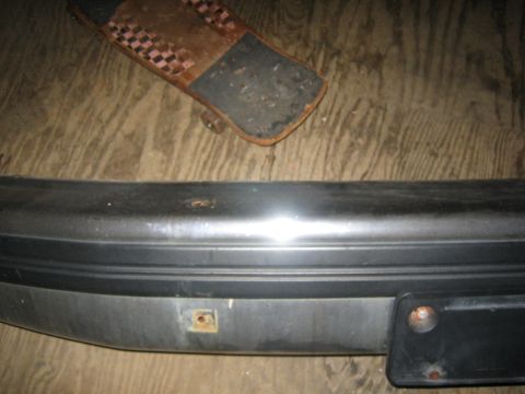 1994 Ford Bronco - A car bumper is shown with a watermark from Supermotors.net.