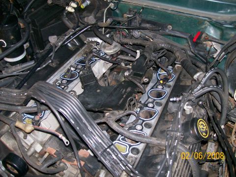 1995 Mercury Grand Marquis - Close-up view of an engine's intake manifold gasket, showing the new seals in place.