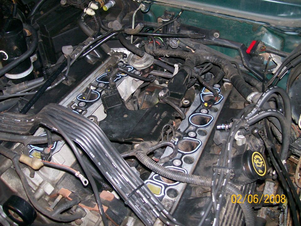Engine intake manifold gasket with new seals