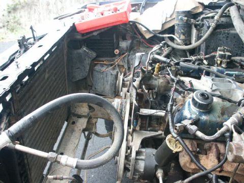 1984 Ford Bronco - Engine bay components including radiator and engine block are visible in this photo.