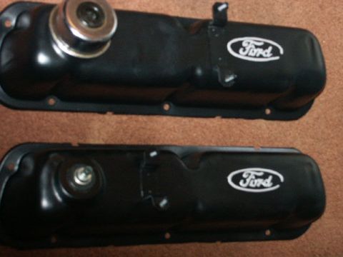 1984 Ford Bronco - Two black Ford valve covers are shown, each bearing a white Ford oval logo.