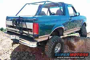 1986 Ford Bronco - This 1987 Ford Bronco is equipped for off-road adventures with a custom roll cage and large tires.