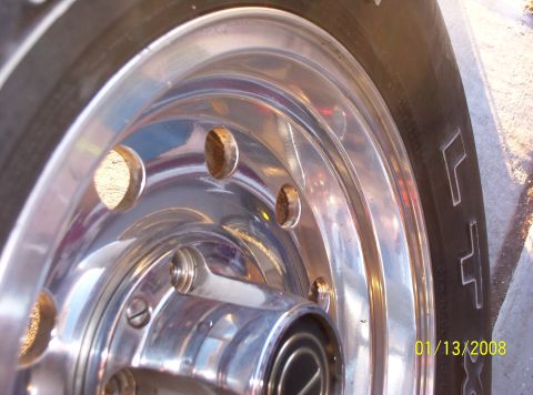1995 Ford Bronco - Close-up of a chrome wheel and tire, with a date stamp from 2008.