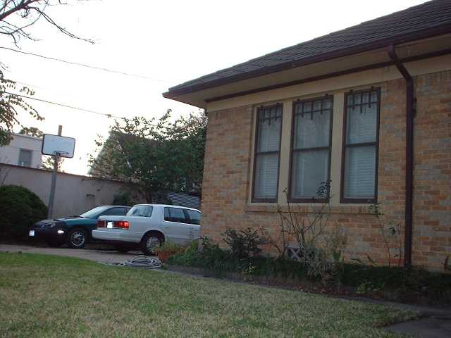 White 1996 Ford Taurus sedan parked curbside