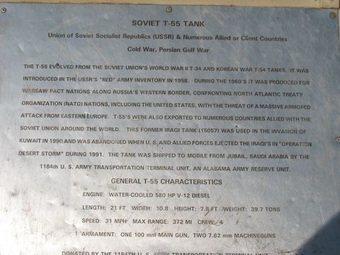 1997 Ford Crown Victoria - A historical plaque describes the Soviet T-55 tank, its origins, and combat history.
