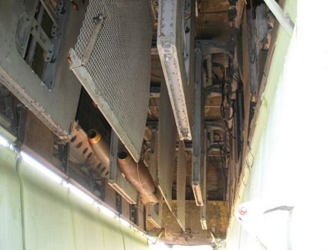 1997 Ford Crown Victoria - This is a view of the underside of an aircraft, showing its internal structure and components.