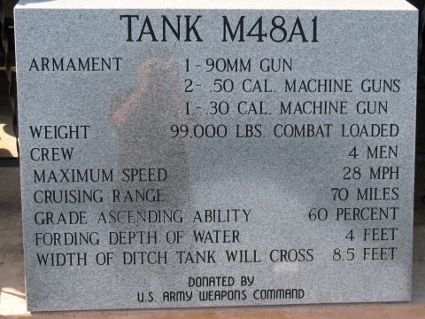 1997 Ford Crown Victoria - Memorial plaque lists the specifications for the M48A1 tank, including its armament and combat load.