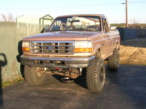 1996 Ford Bronco - This 1996 Ford Bronco features a lifted suspension and a prominent front grille.