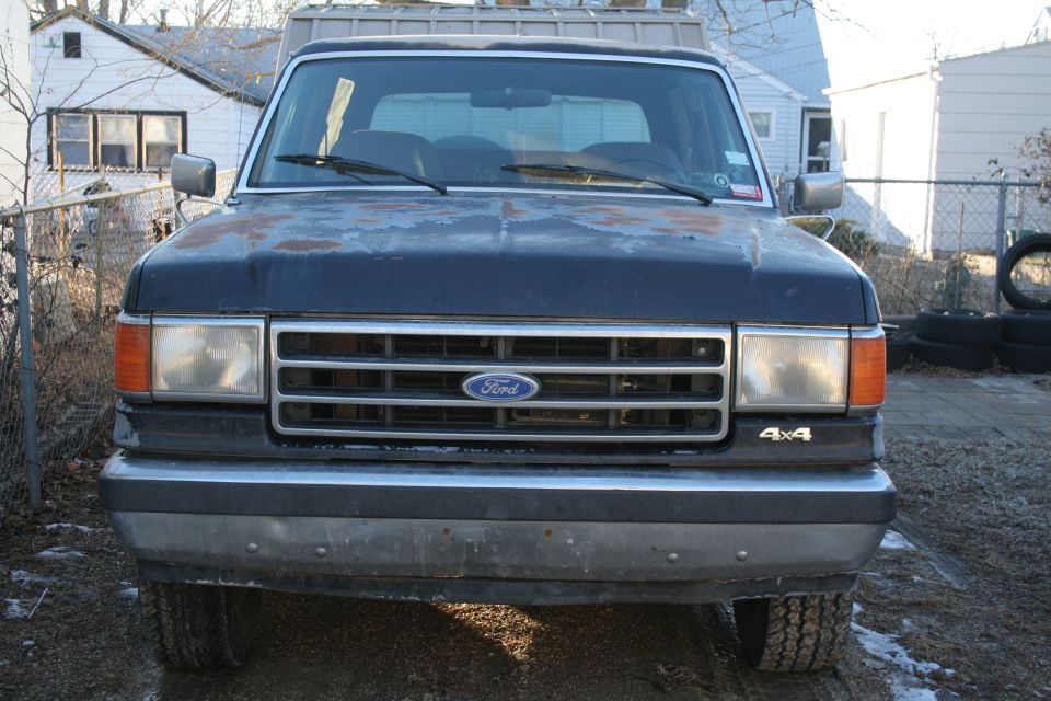 1990 Ford Bronco front view, showing grille and headlights