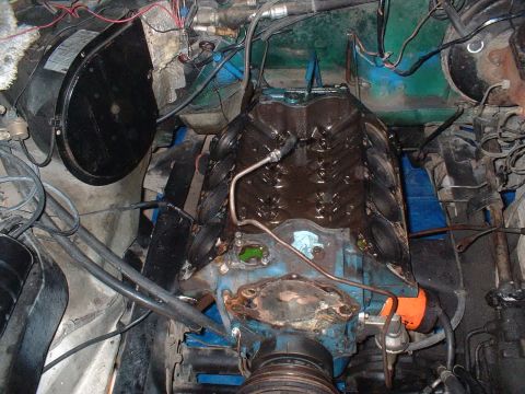 1978 Ford Bronco - Close-up view of an engine bay, showing the engine block and surrounding components.