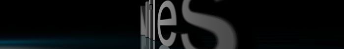 Close-up of the word "miles" in large, silver, 3D lettering against a black background