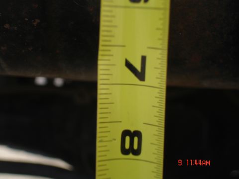 1979 Ford Bronco - Close-up of a measuring tape indicating inches, likely for a vehicle part.