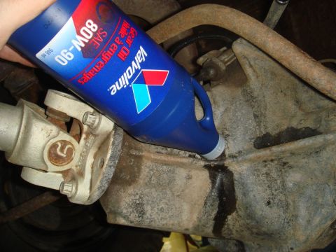 1996 Ford Bronco - Adding gear oil to a vehicle's differential.