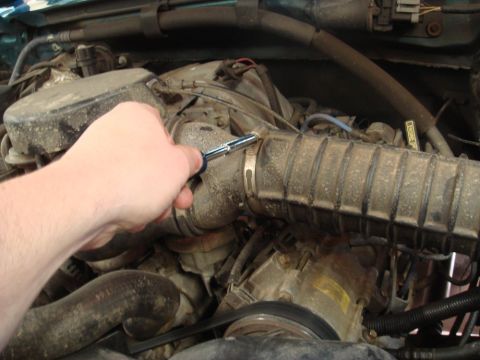 1996 Ford Bronco - Working on the air intake system of a 1996 Ford Bronco.