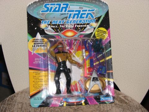 1991 Ford Bronco - This is a packaged action figure of Geordi La Forge from Star Trek: The Next Generation, including various accessories.