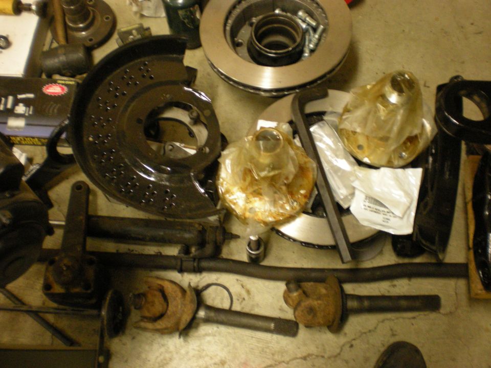 Vehicle parts including brake rotors and hubs