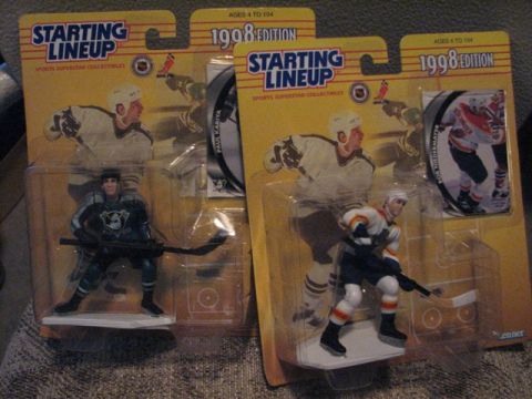 1991 Ford Bronco - Two 1998 Edition Starting Lineup hockey player collectibles are shown in their original packaging.