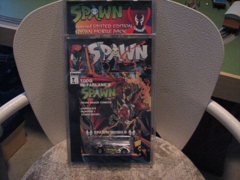 1991 Ford Bronco - This is a special limited edition Spawn Mobile pack, a toy car and comic book art.
