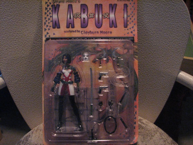 Kabuki action figure in blister pack with accessories, including swords and guns