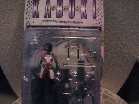 1991 Ford Bronco - Kabuki action figure in packaging with accessories. Album claims 1991 Ford Bronco.
