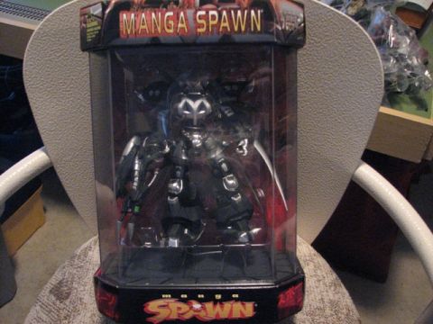 1991 Ford Bronco - Action figure of Manga Spawn, a character from comic books, displayed in its original packaging.