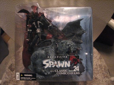 1991 Ford Bronco - Action figure of Spawn, the classic comic character, is displayed in its original packaging.