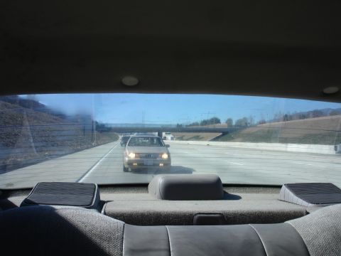 1991 Ford Taurus - Driving on the highway behind a 1991 Ford Taurus.