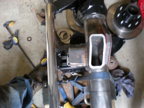 1993 Ford Bronco - Modified vehicle axle assembly with brake components, likely undergoing a custom build.