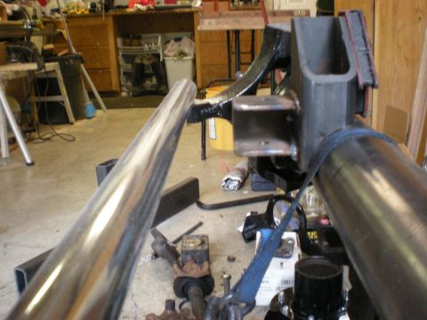 1993 Ford Bronco - Workshop scene with focus on custom vehicle suspension components, possibly for off-road modification.
