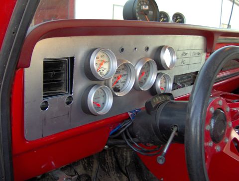 1978 Ford Bronco - Interior view of a custom dashboard various gauges and controls, with handwritten labels.