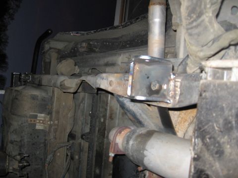 1994 Ford Bronco - This image shows a close-up view of a modified vehicle frame with newly welded metal components.