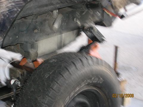1994 Ford Bronco - A close-up view of a vehicle's undercarriage and tire, dated 02/10/2008.