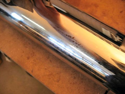 1985 Ford LTD Crown Victoria - Close-up of chrome trim showing some surface rust and pitting.