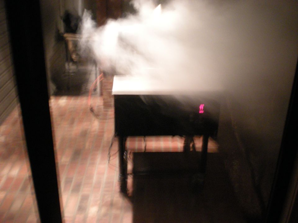 Black box emitting smoke with a pink digital display showing '11'