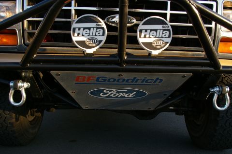 1986 Ford Bronco - Modified Ford Bronco front end with BF Goodrich skid plate and Hella lights.