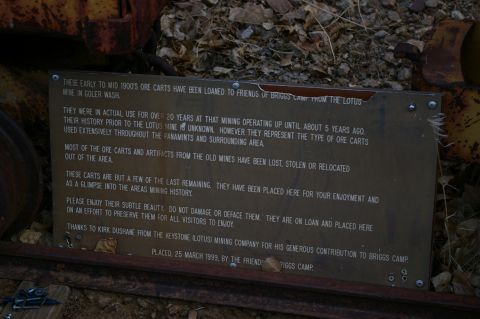 1986 Ford Bronco - Sign details the history and placement of ore carts from the Lotus Mine in Golar Wash.