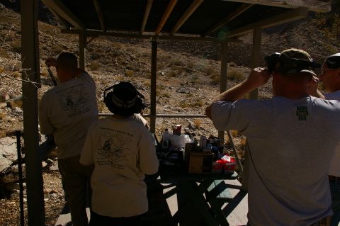 1986 Ford Bronco - Several individuals are at a shooting range, preparing to shoot or observing.