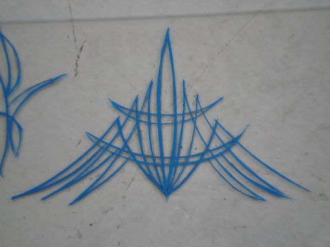 1979 Chevrolet C/K Pickup - Blue pinstriping adorns a gray surface, with the Supermotors.net logo in the lower right corner.