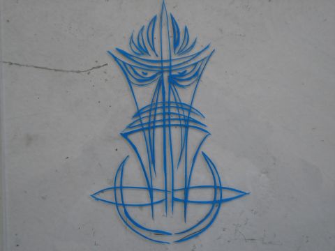 1979 Chevrolet C/K Pickup - Blue pinstripe art design on a wall.