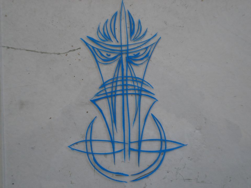 Blue pinstripe art on a gray textured surface