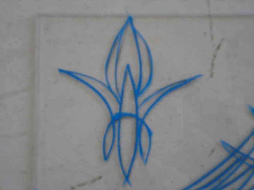 blue pinstripe art on a light gray surface, with a watermark at the bottom right