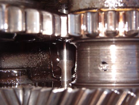 1975 Ford Bronco - The front shift rail has position detents in its L side and pill grooves in its R.