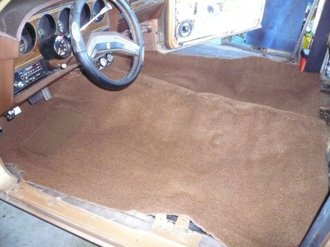 1975 Ford Ranchero - Installing new brown carpet in a 1975 Ford Ranchero interior.